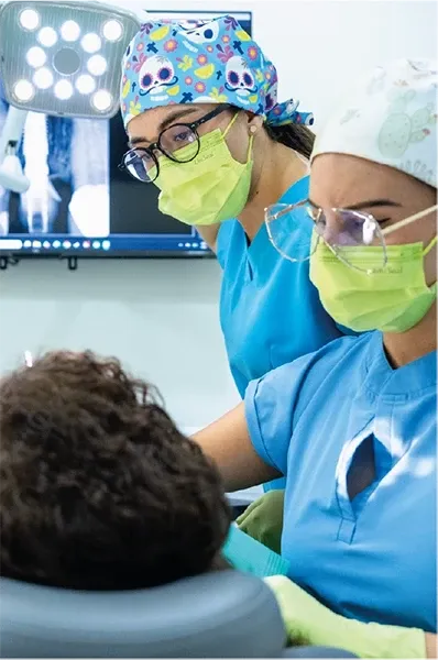 Experienced Cabo San Lucas dentists delivering a personalized smile makeover treatment for an adult patient.